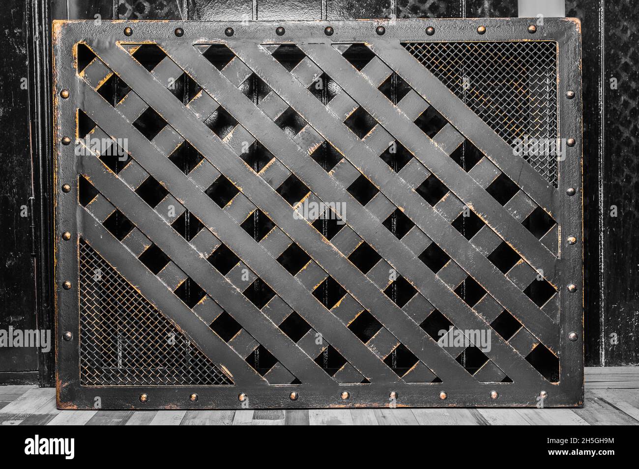 Black Mesh Abstract Iron Lattice Pattern Steel Dark Texture Grid Background. Stock Photo