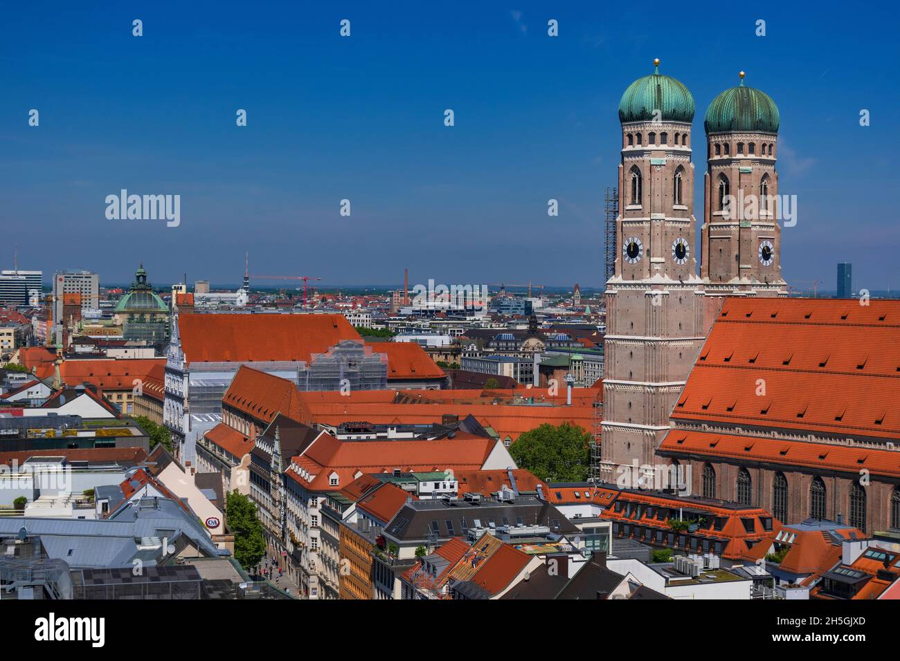 22 May 2019 Munich, Germany - Frauenkirche, gothic church with iconic domed towers. View from Peterskirche tower, panorama of Munich Stock Photo