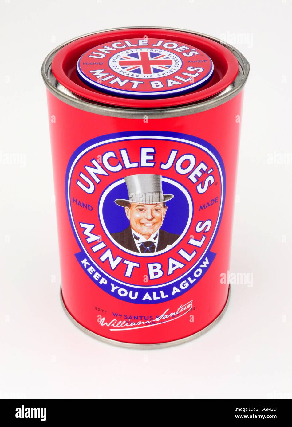 Tin of Uncle Joe's mint balls a classic British traditional hard boiled sweets produced by William Santus in Wigan Greater Manchester Stock Photo