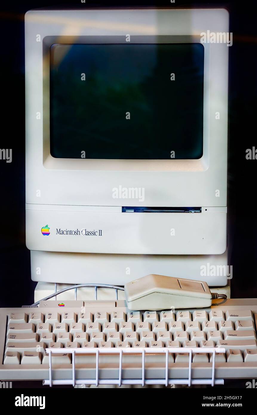 An Apple Macintosh Classic II computer is pictured in a shop window, Nov. 6, 2021, in Mobile, Alabama. The Macintosh Classic II was sold 1991-1993. Stock Photo