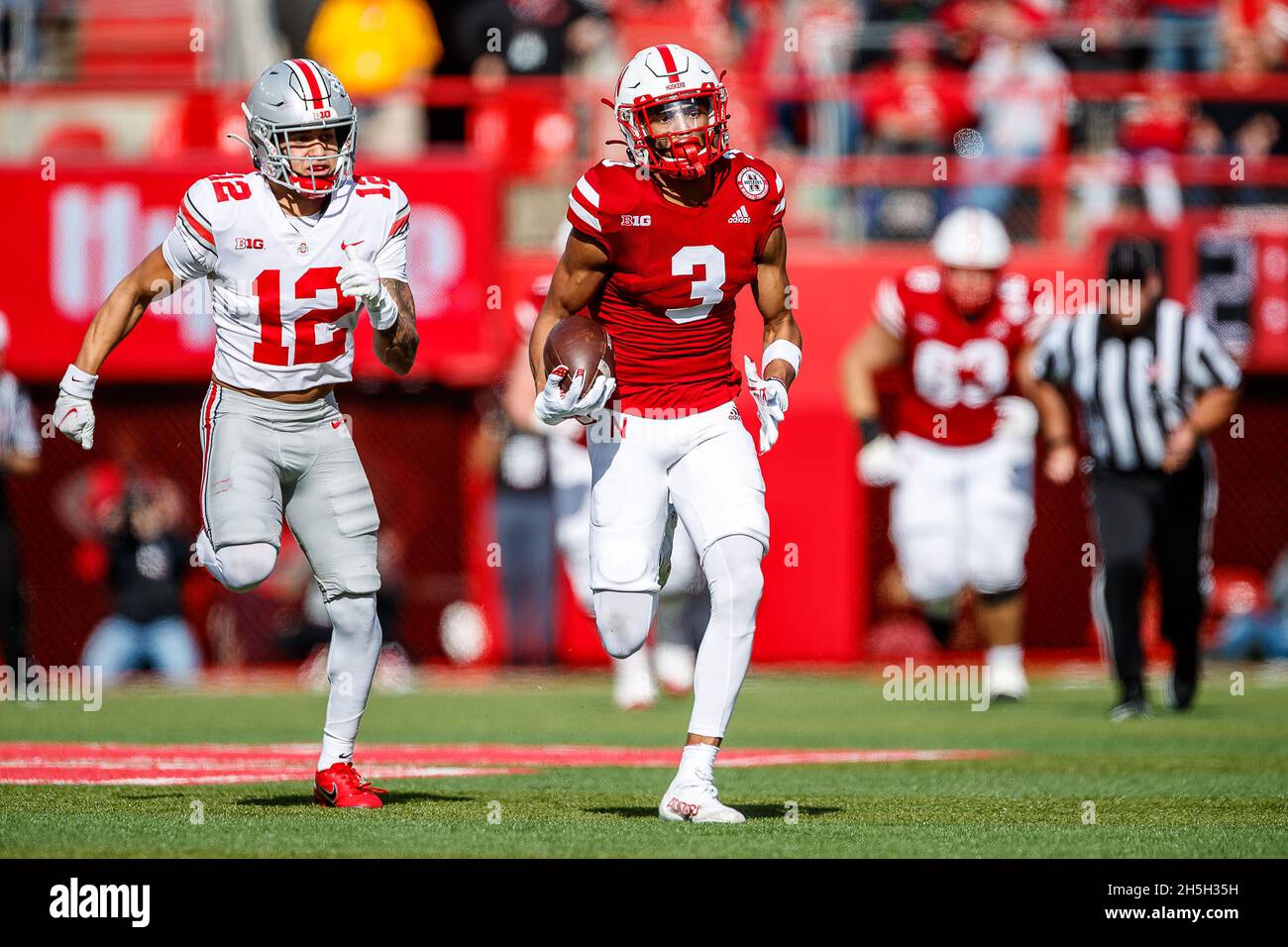 Lincoln, NE. U.S. 06th Nov, 2021. Nebraska Cornhuskers wide receiver Samori Toure #3 breaks free for the goal line as Ohio State Buckeyes safety Lathan Ransom #12 gives chase in action during a NCAA Division 1 football game between Ohio State Buckeyes and the Nebraska Cornhuskers at Memorial Stadium in Lincoln, NE. Ohio State won 26-17.Attendance: 84,426.381st consecutive sellout.Michael Spomer/Cal Sport Media/Alamy Live News Stock Photo