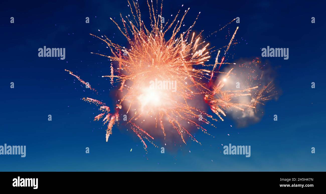 Digital image of red fireworks exploding in the blue sky Stock Photo