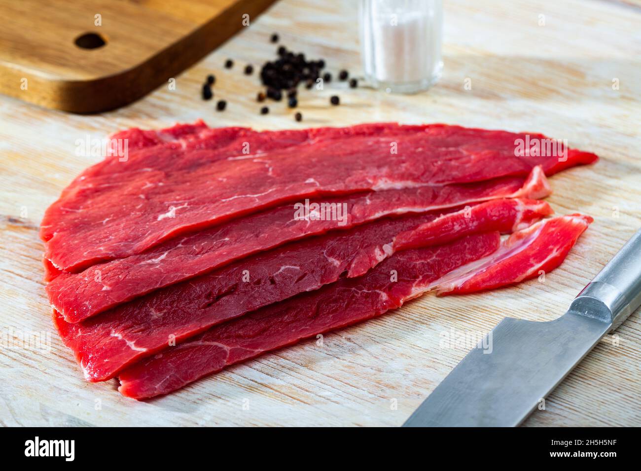 Image of raw a beef fillet cut into pieces Stock Photo Alamy