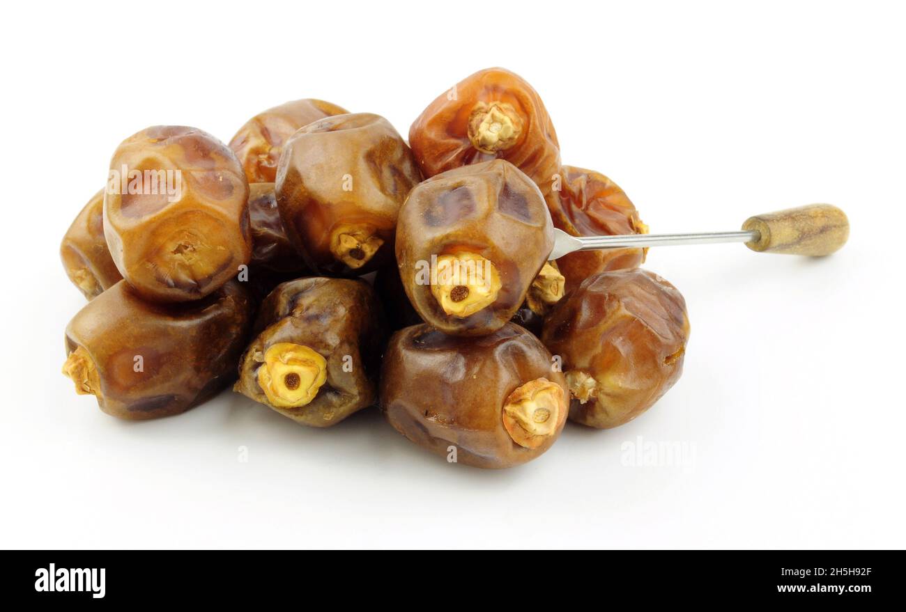Group of ripe soft and sticky Zamli dates fruit, Zamli dates have a
