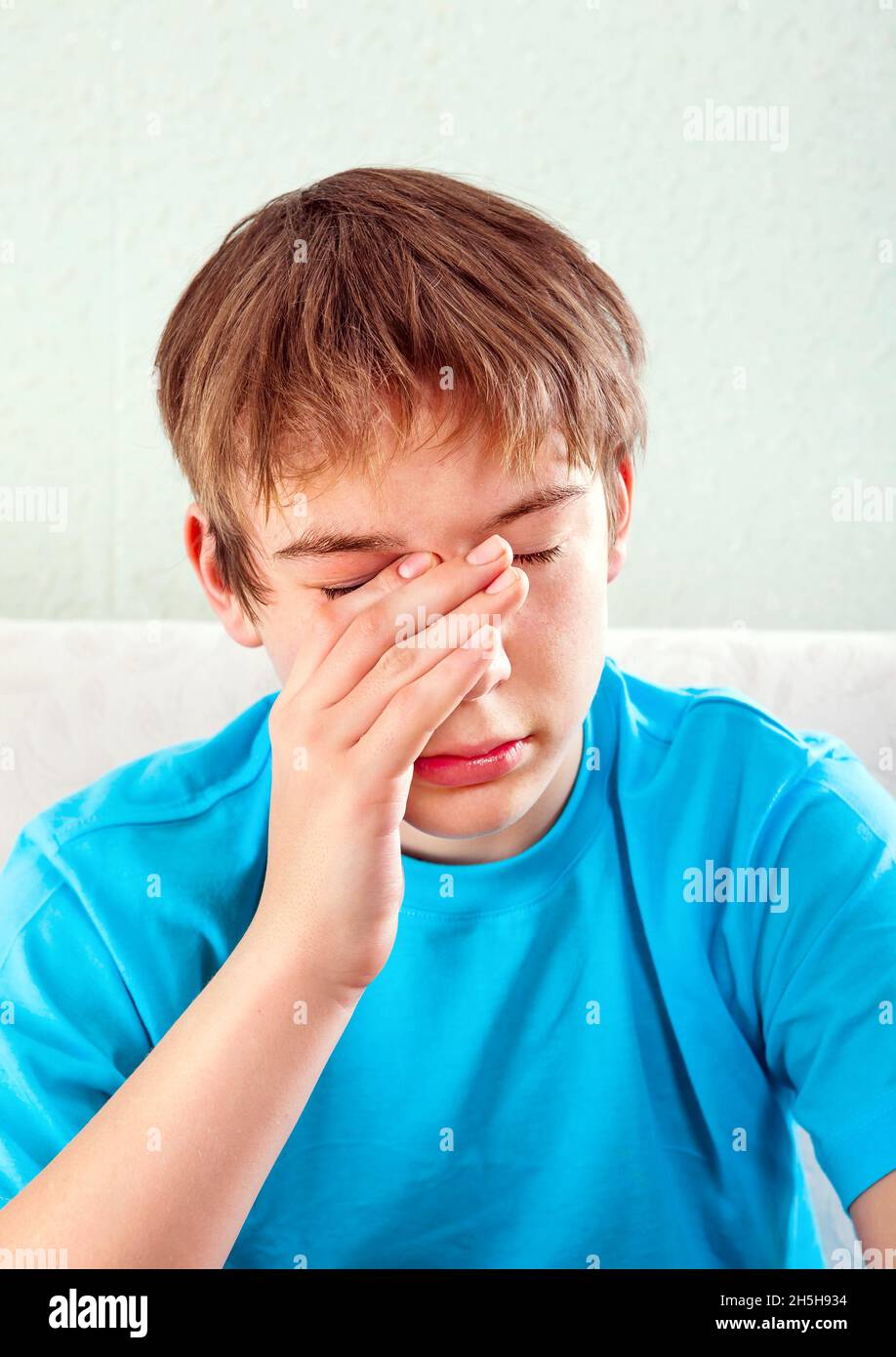 Sad Teenager on the Sofa at the Home Stock Photo - Alamy