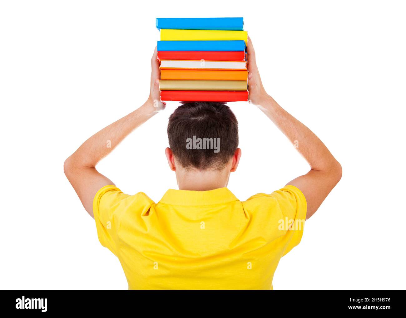 Teenager Rear View with a Books on a Head Isolated on the White Background Stock Photo