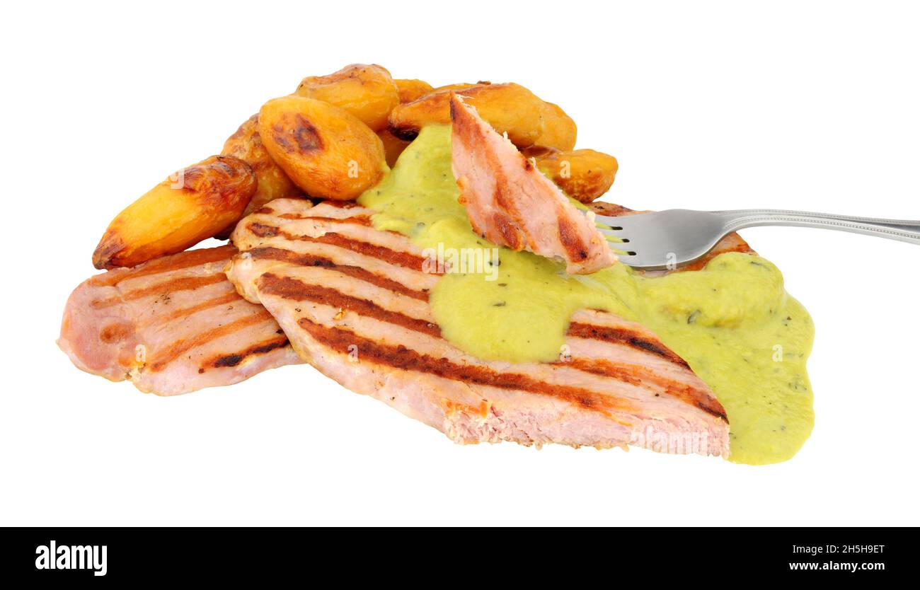 Grilled gammon topside ham steaks and roast potatoes with creamy mint ...