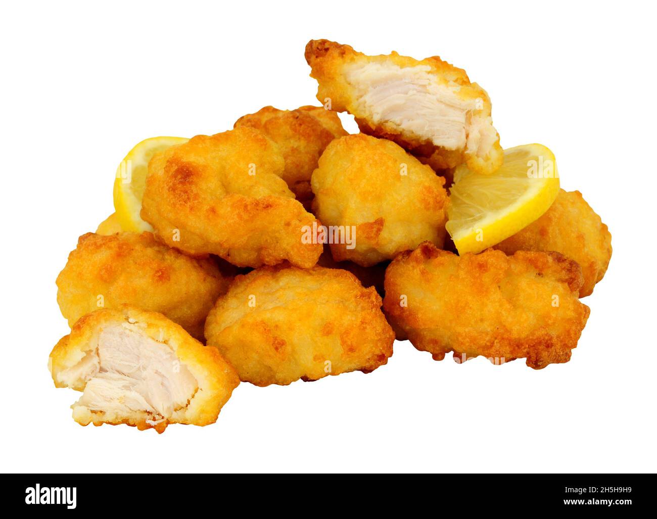 Group of tempura battered chicken nuggets isolated on a white