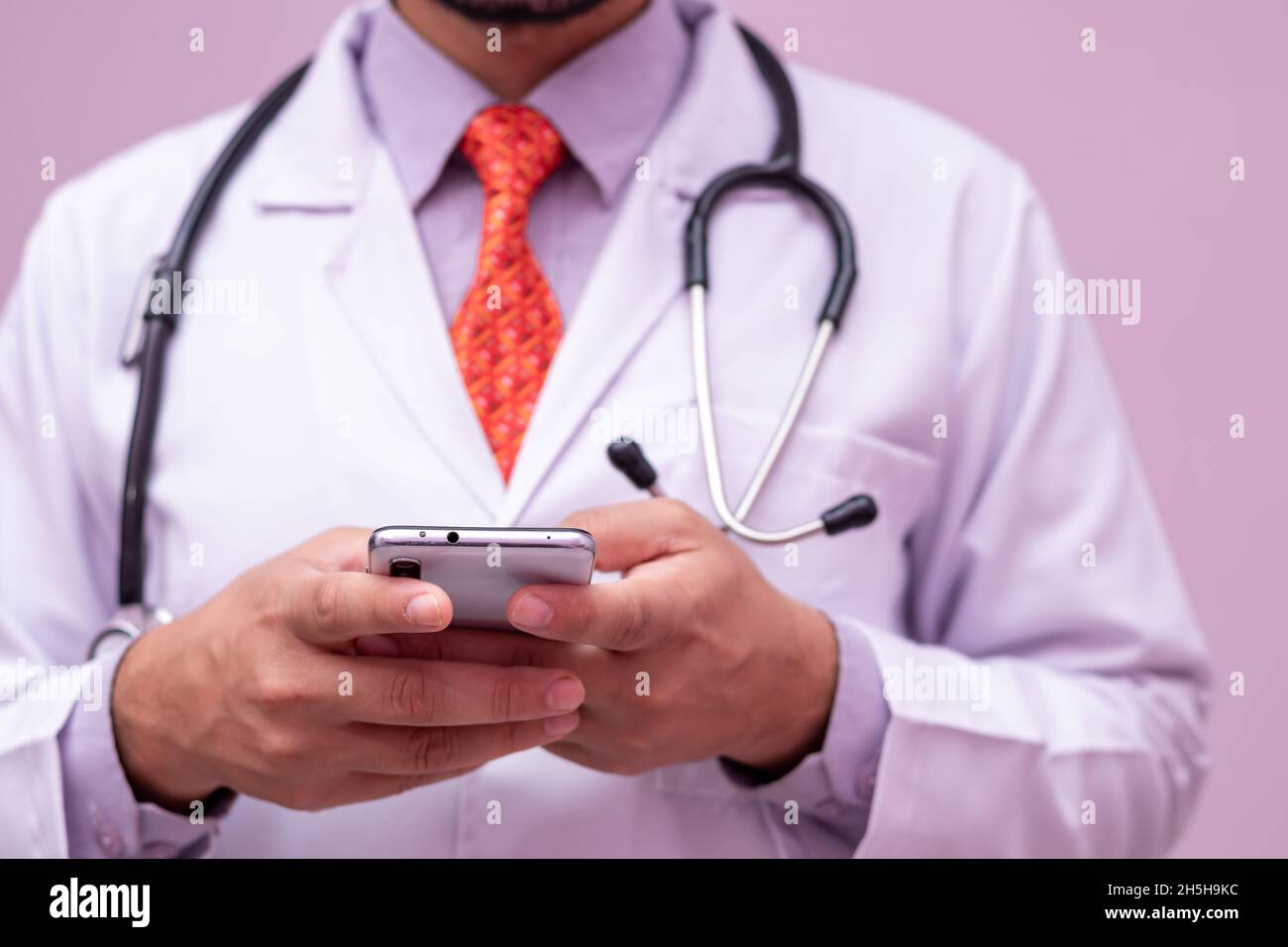 Medical App. Smartphone In Hands Of Male Doctor on isolated Background ...