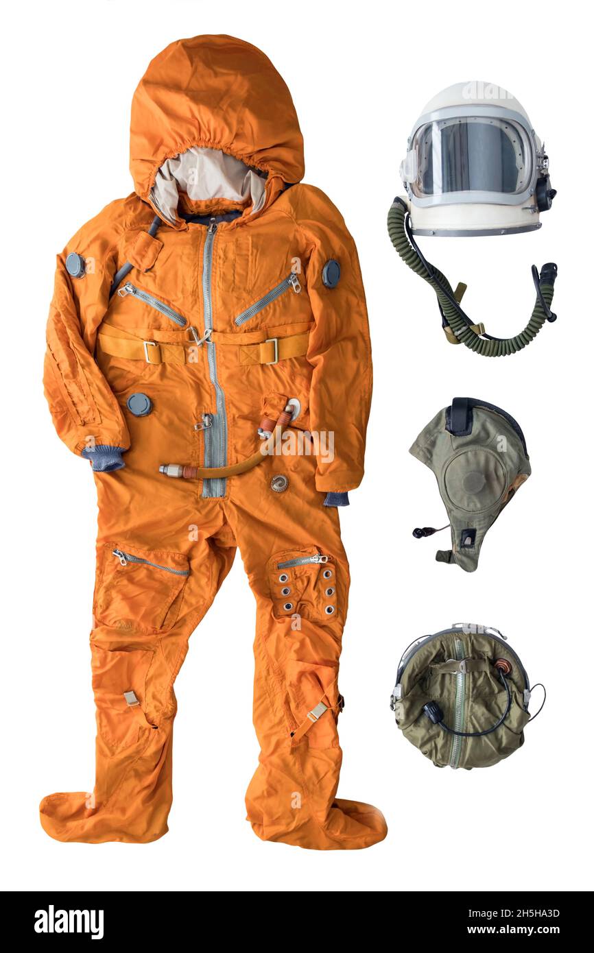 Flat lay of astronaut orange space suit, space helmet and astronaut space suit accessories isolated on white background Stock Photo