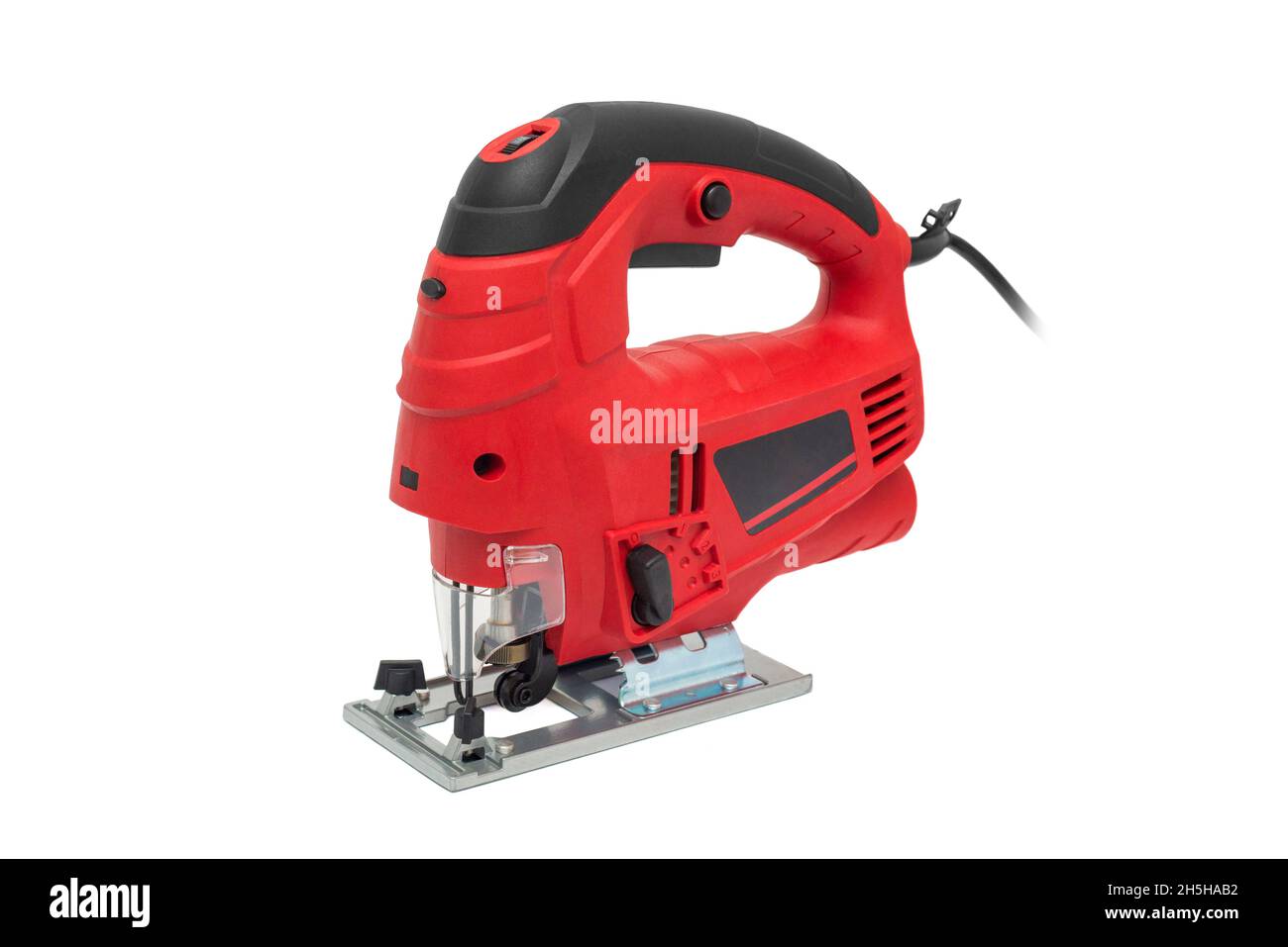 A jigsaw power tool isolated on white background. Electric jig saw. Professional electric jig saw isolated on white background. Electric fretsaw on a Stock Photo