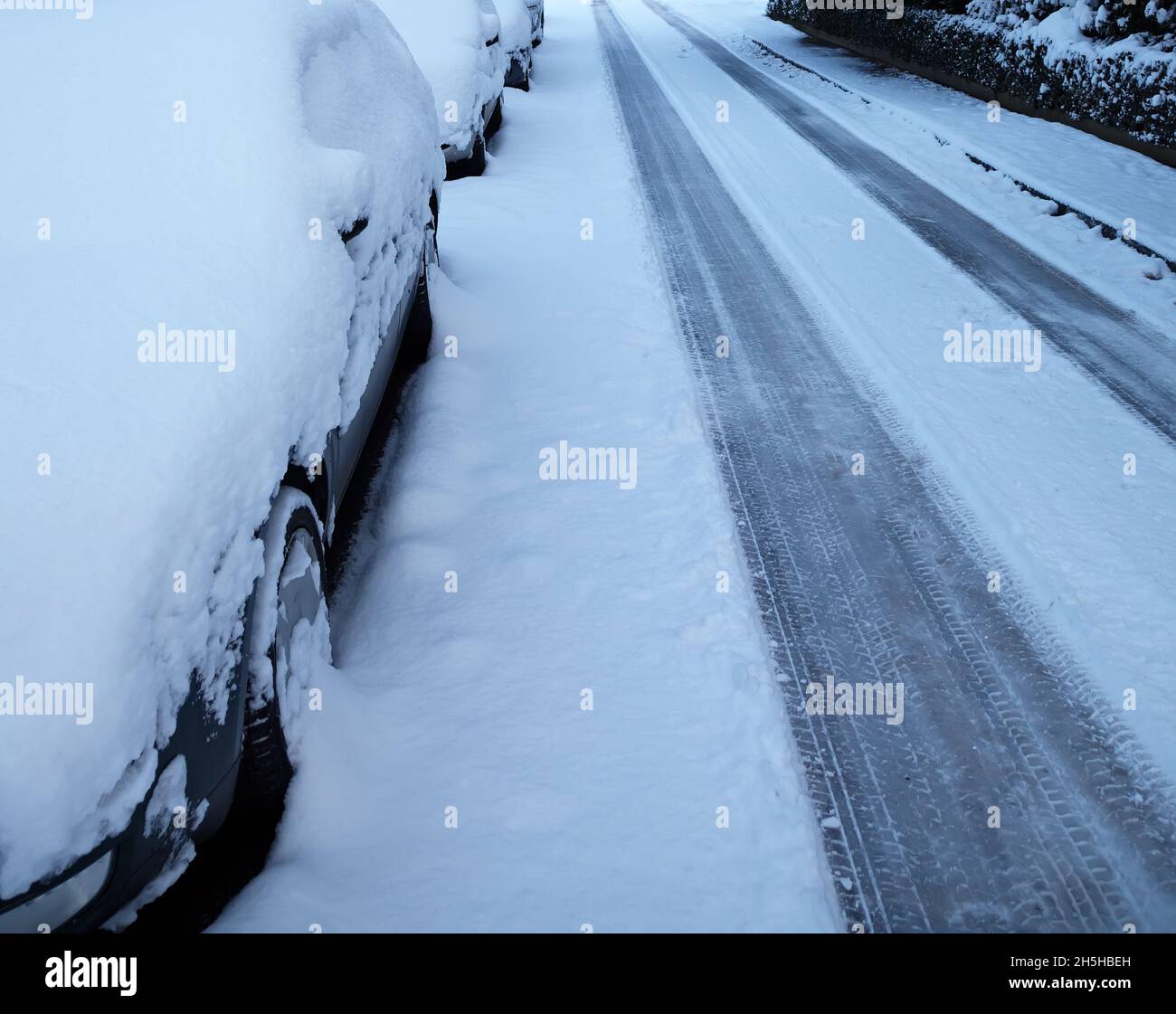 Parking cars covered with snow Stock Photo
