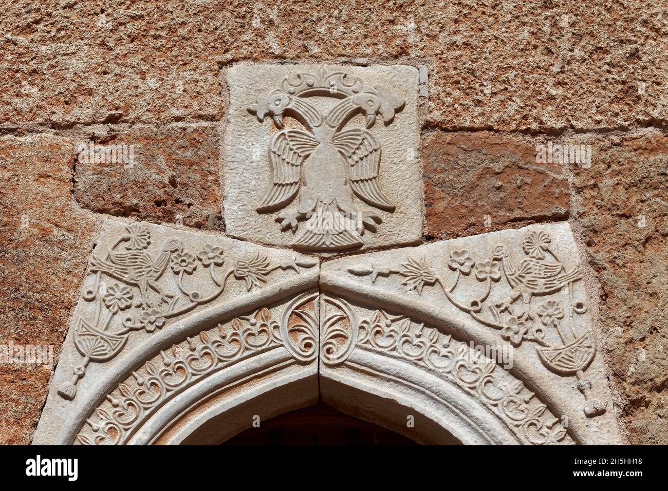 Double-headed eagle relief on Agios Spiridon Church, symbol of the Greek Orthodox Church, Old Kardamili Museum Village, Kardamili, Mani Peninsula Stock Photo