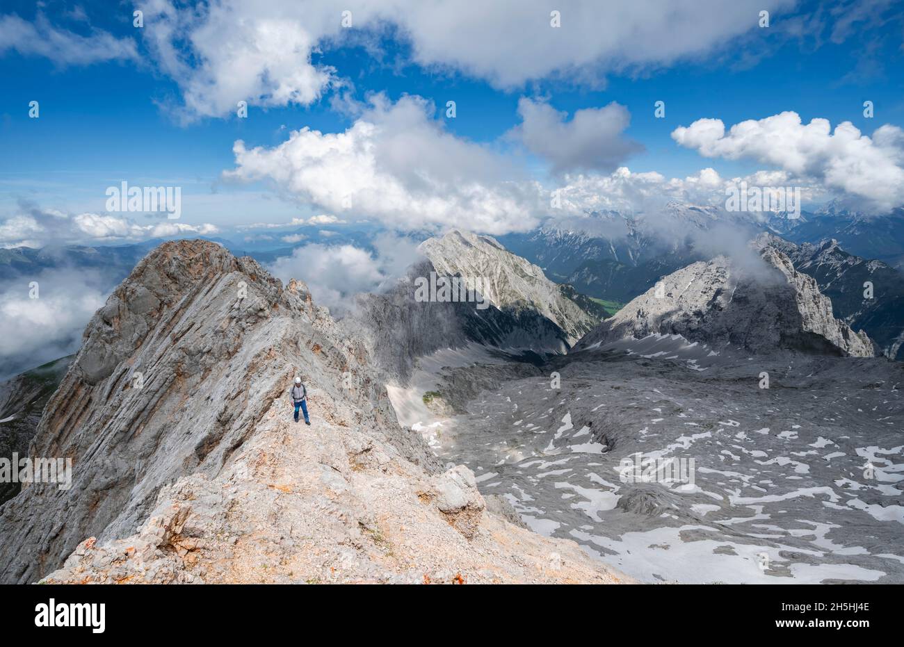 Hiker at the Wettersteingrad, Patenkirchner Dreitorspitze, Wetterstein Mountains, Garmisch