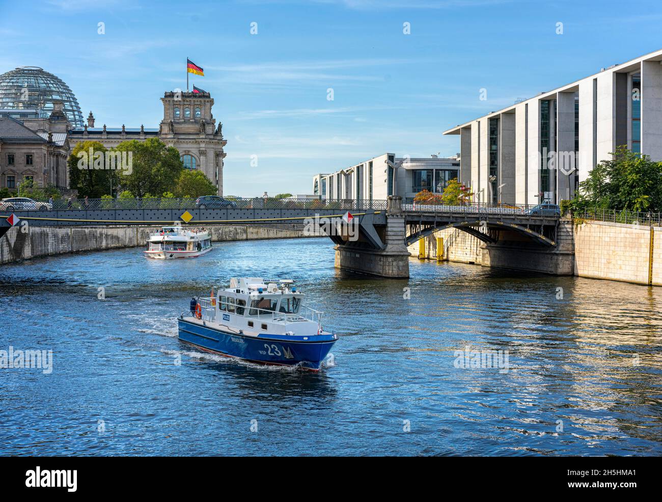 Boat of the water police on the Spree in Berlin's government district, Berlin, Germany Stock Photo