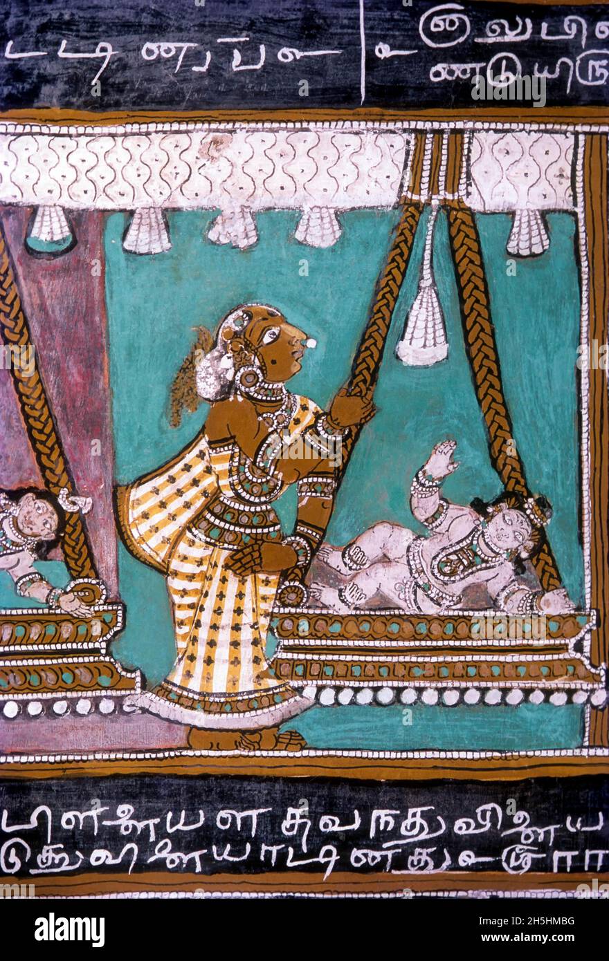 400 years old Ramayana; old baby Rama in cradle; painting at Alagar koyil near Madurai, Tamil Nadu, India Stock Photo