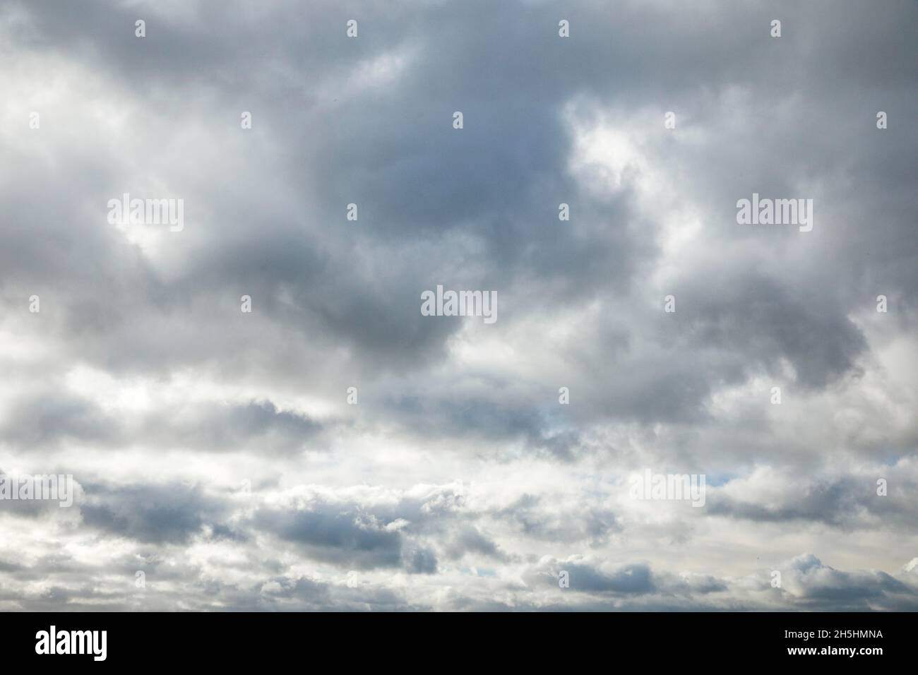Stratocumulus clouds form spectacular cloud formation in the sky during Foehn storm Stock Photo