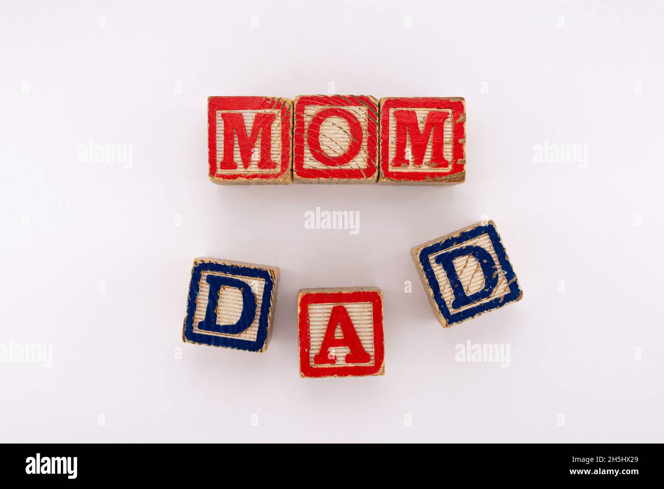 Symbols of father and mother in wooden cubes Stock Photo - Alamy