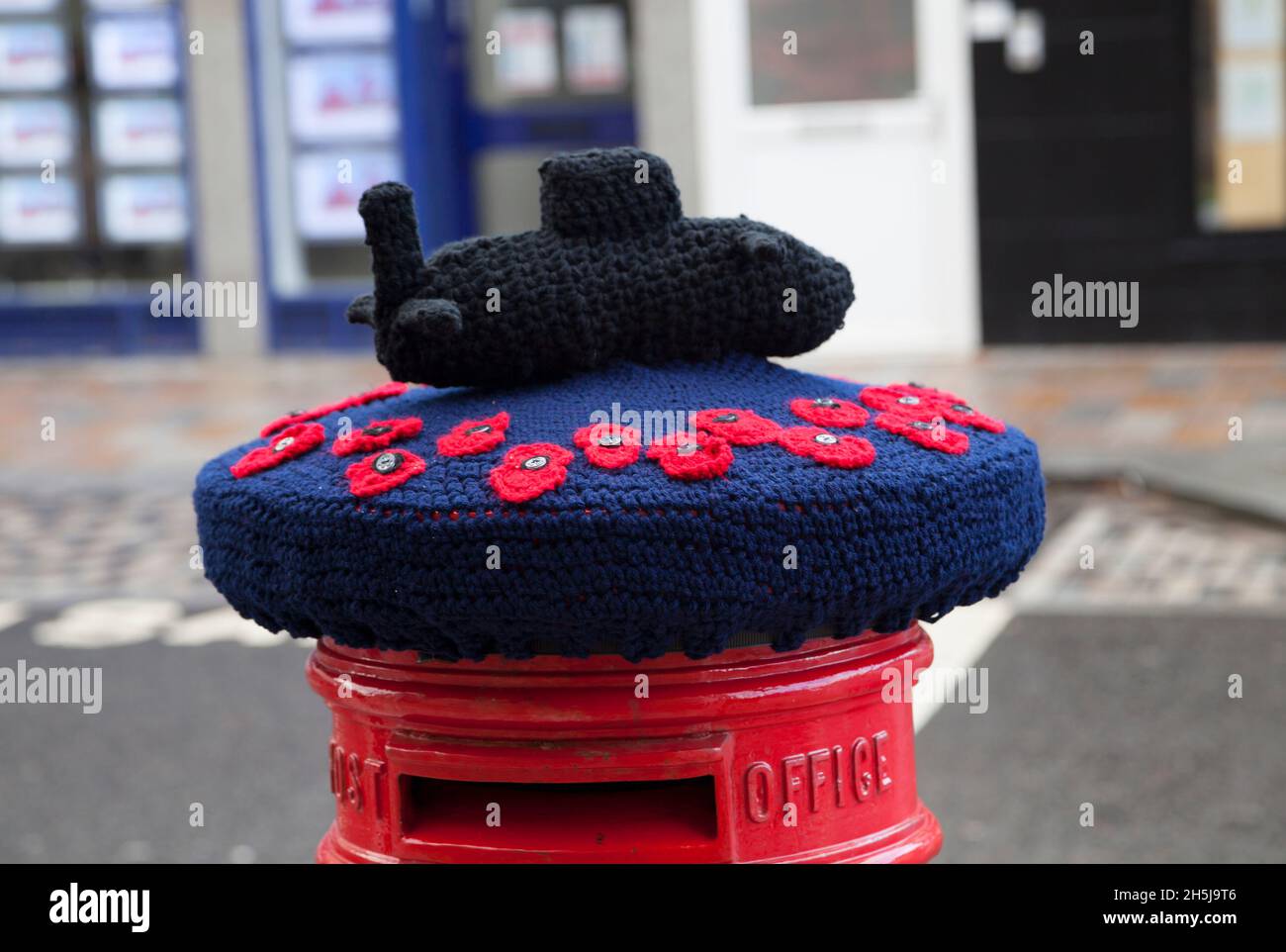 Crochet remembrance on a post box with a submarine, Helensburgh, Scotland Stock Photo