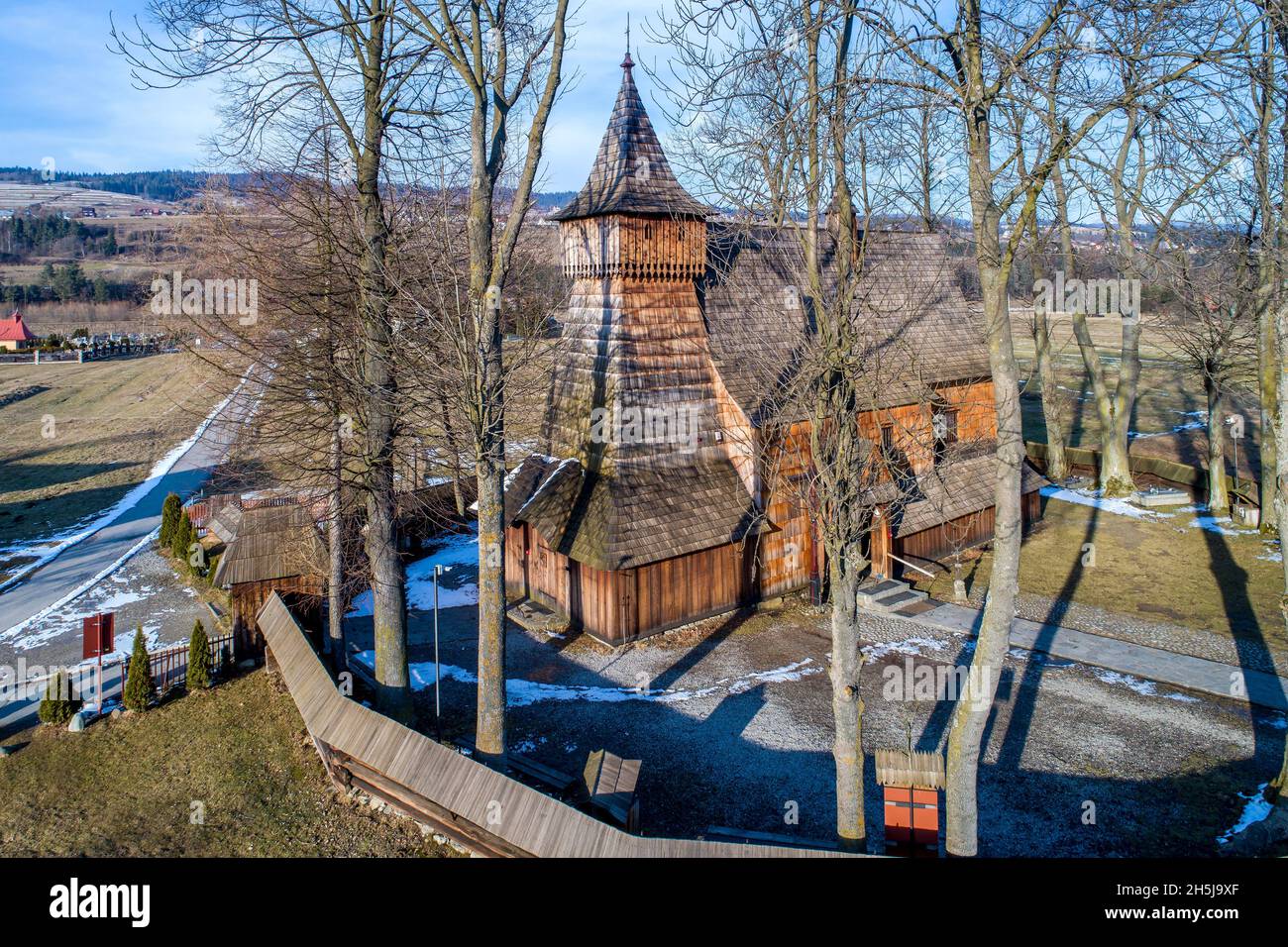 Debno, Poland. Medieval wooden Gothic church of the Saint Archangel Michael, built in 15th century, still active, with the oldest wooden polychrome in Stock Photo