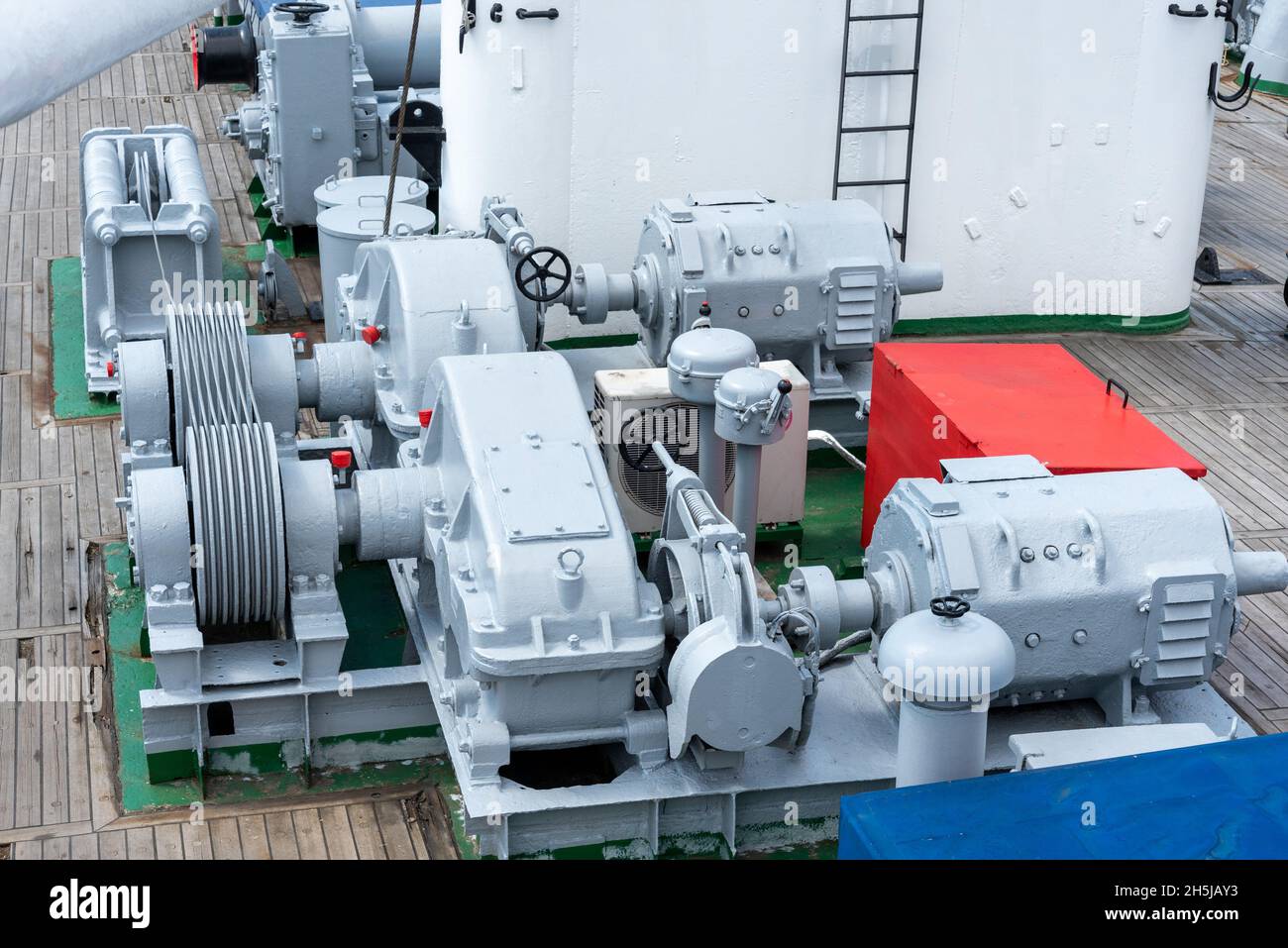 mooring winches on the deck of a container ship, equipment on the deck