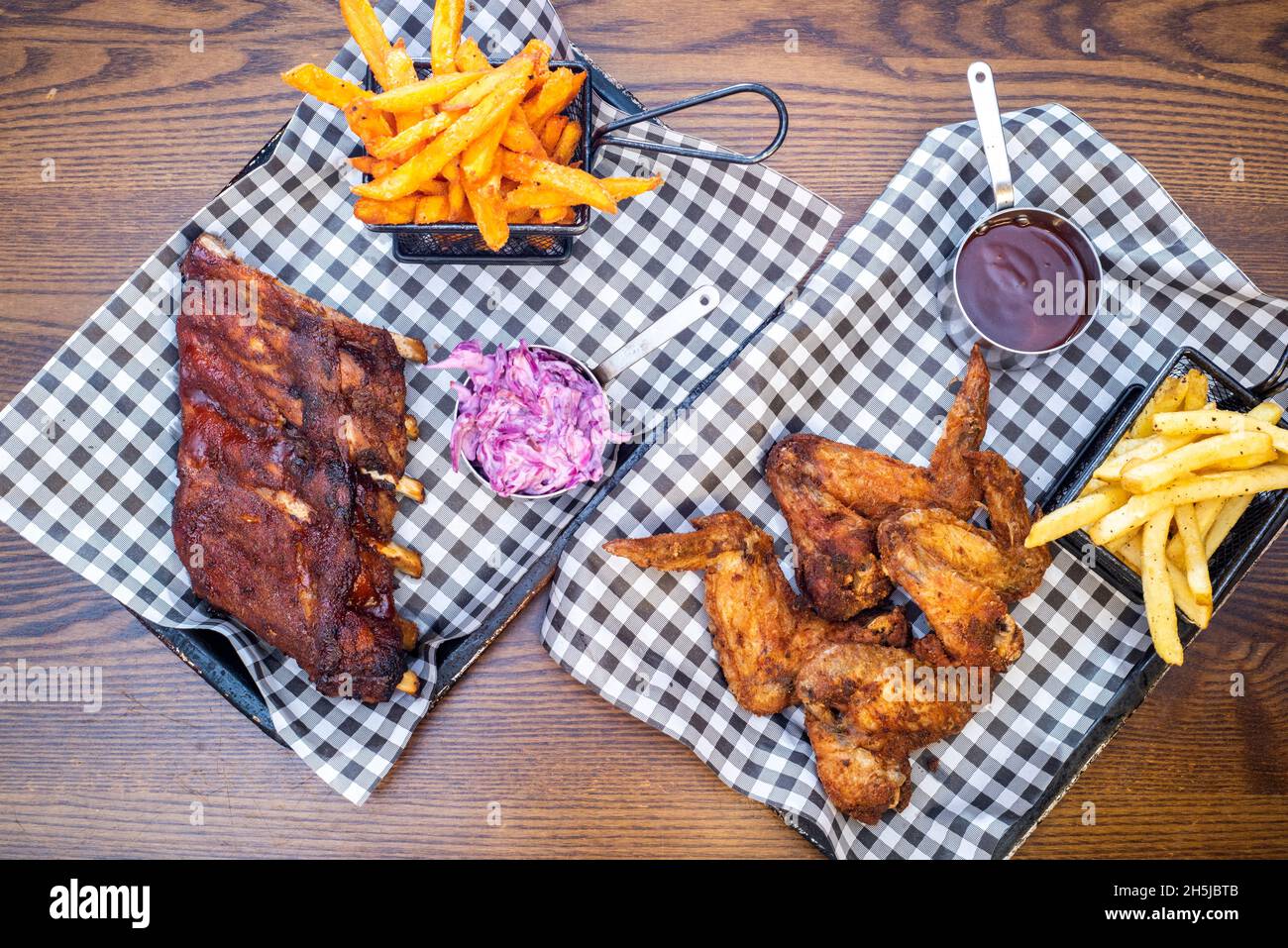 Sheffield UK 01 May 2018 Rack of ribs and fried chicken and fries
