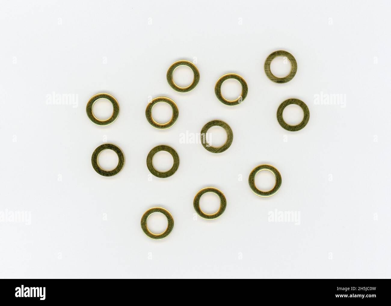 many brass washers for door and window hinges Stock Photo Alamy
