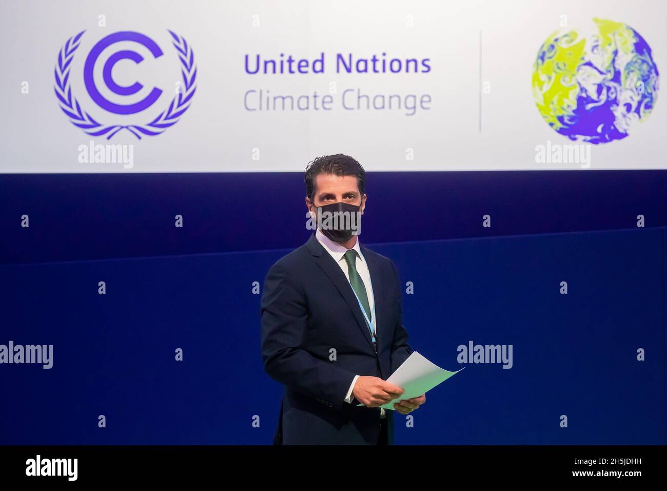 Glasgow, UK. 10th Nov, 2021. Joaquim Alvaro Pereira Leite, Minister of Environment of Brazil, waits before his speech at the UN Climate Change Conference COP26 in Glasgow. For two weeks in Glasgow, some 200 countries are wrestling with how the goal of limiting global warming to 1.5 degrees compared to pre-industrial times, if possible, can still be achieved. Credit: Christoph Soeder/dpa/Alamy Live News Stock Photo