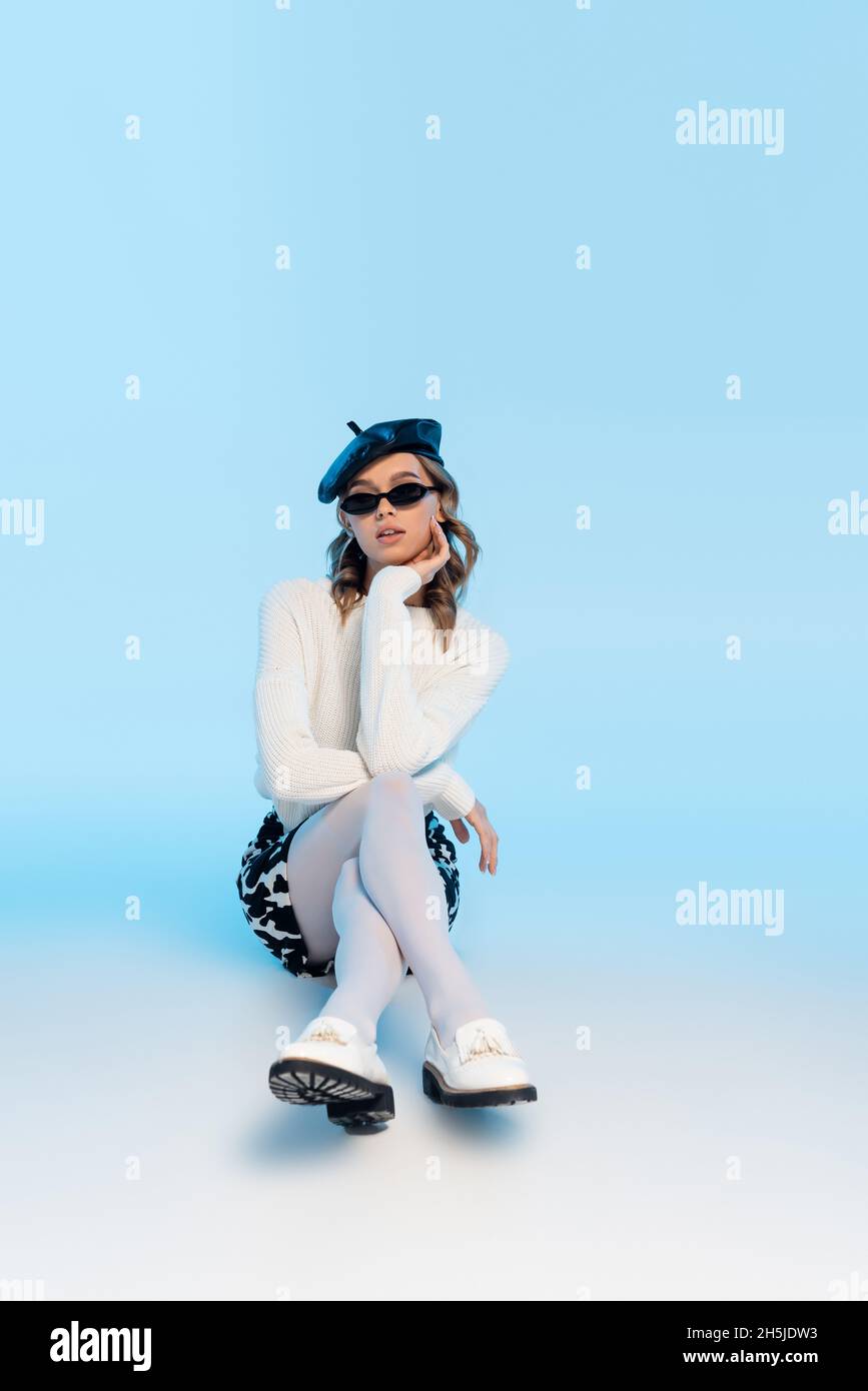 Young woman beret sunglasses in hi-res stock photography and images - Alamy