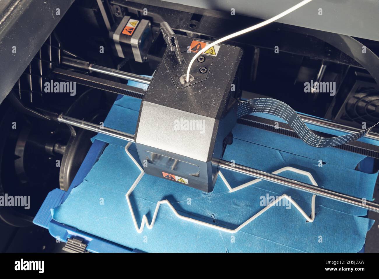 3D printer printing plastic figure Stock Photo