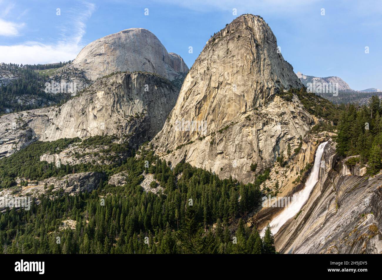 Breathtaking view on Nevada fall and Liberty cap mountain. Typical beautiful sunny day in Yosemite National Park. Stock Photo