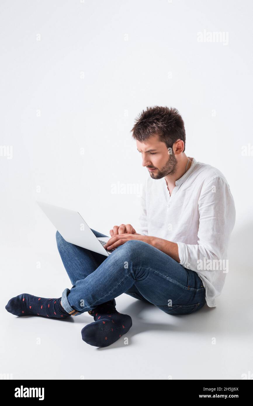 emotional man and notebook Stock Photo - Alamy