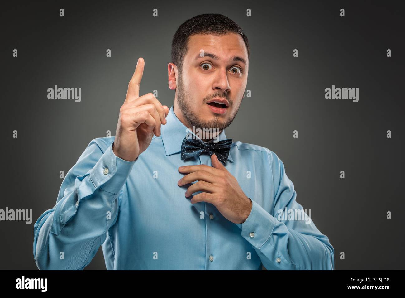 Raised his index finger hi-res stock photography and images - Alamy