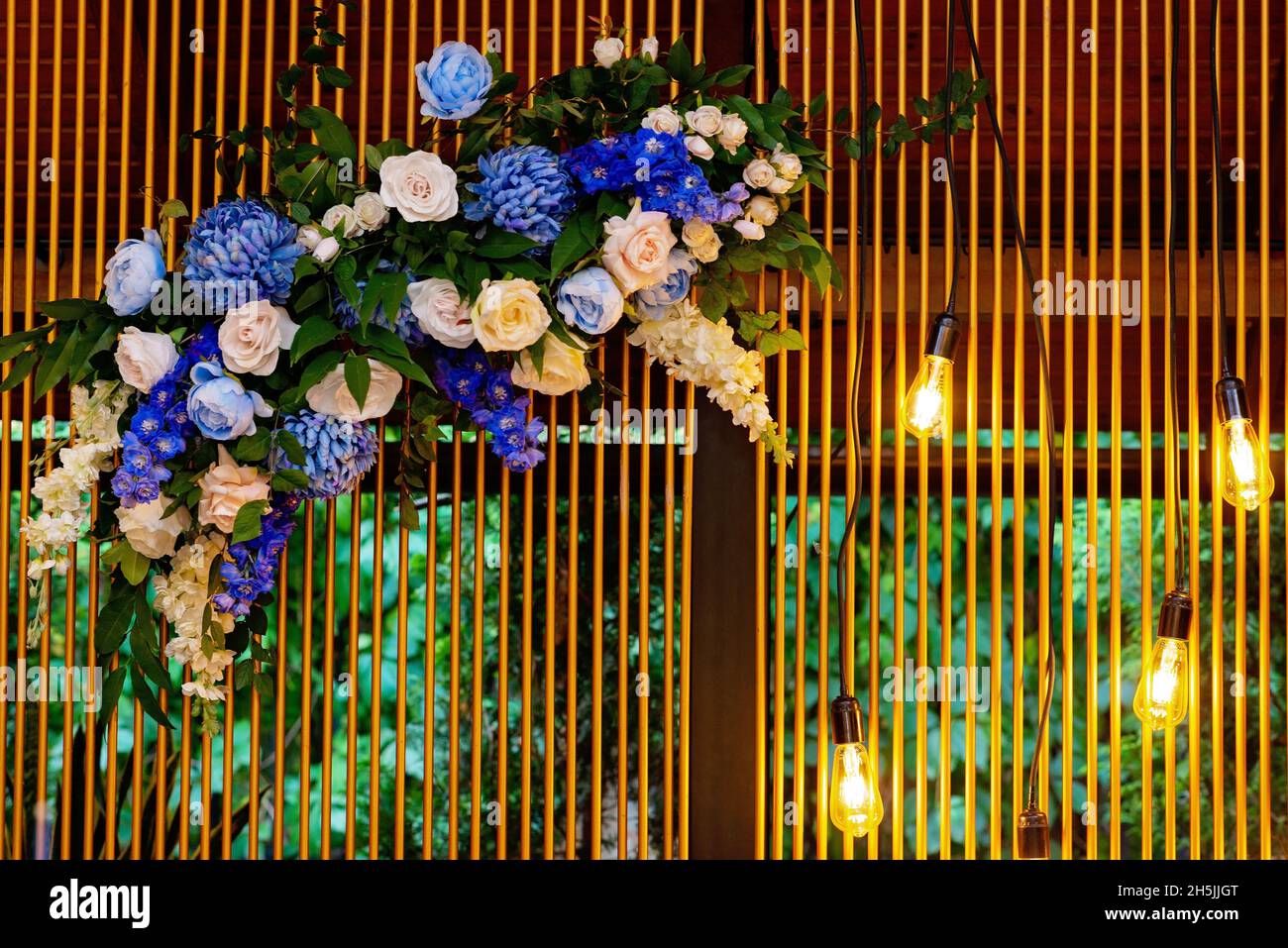 Wedding presidium, banquet table for newlyweds with flowers, greenery ...
