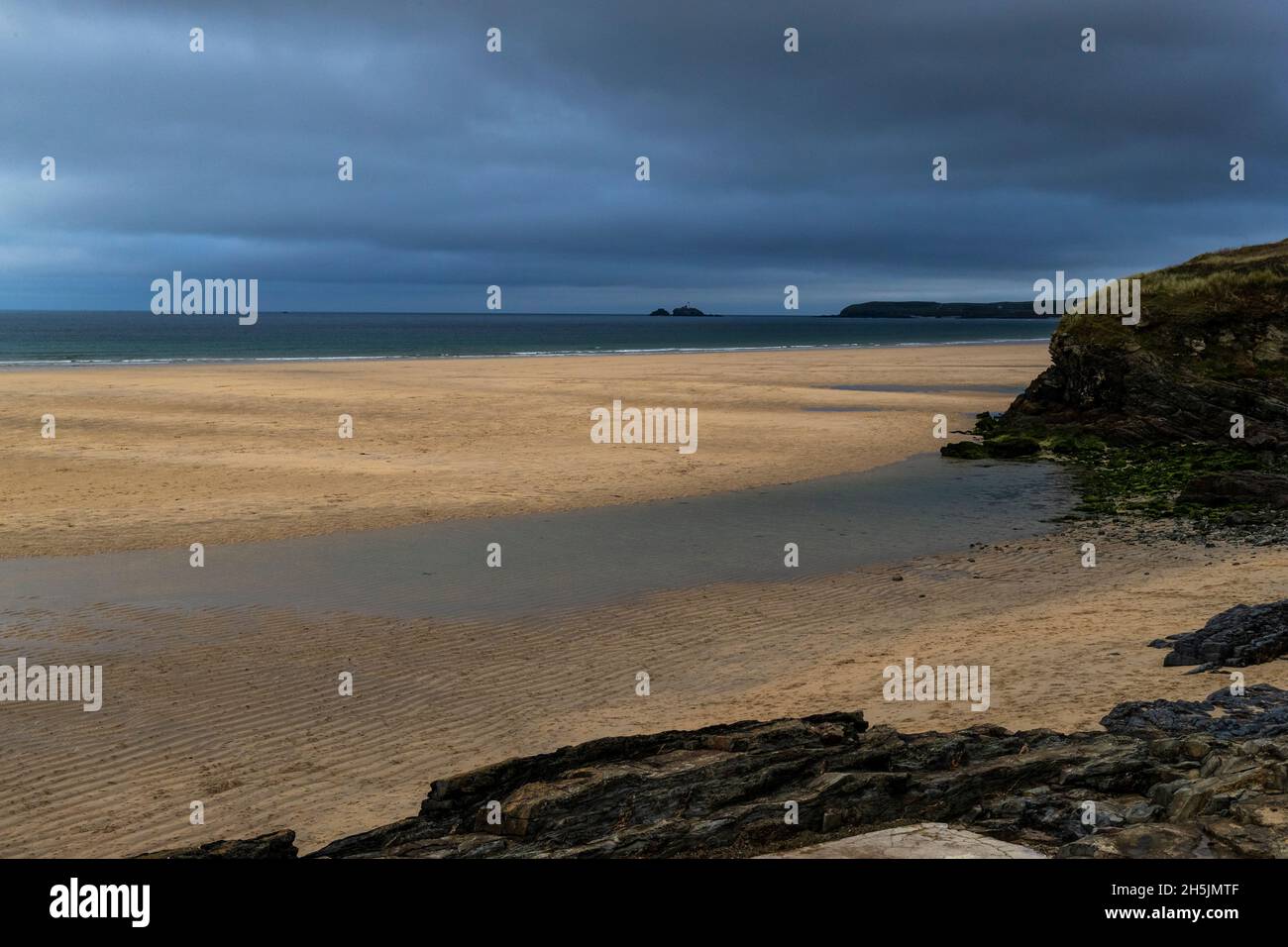 Hayle Towans beach and The Bluff. Large beach and rocks looking out to
