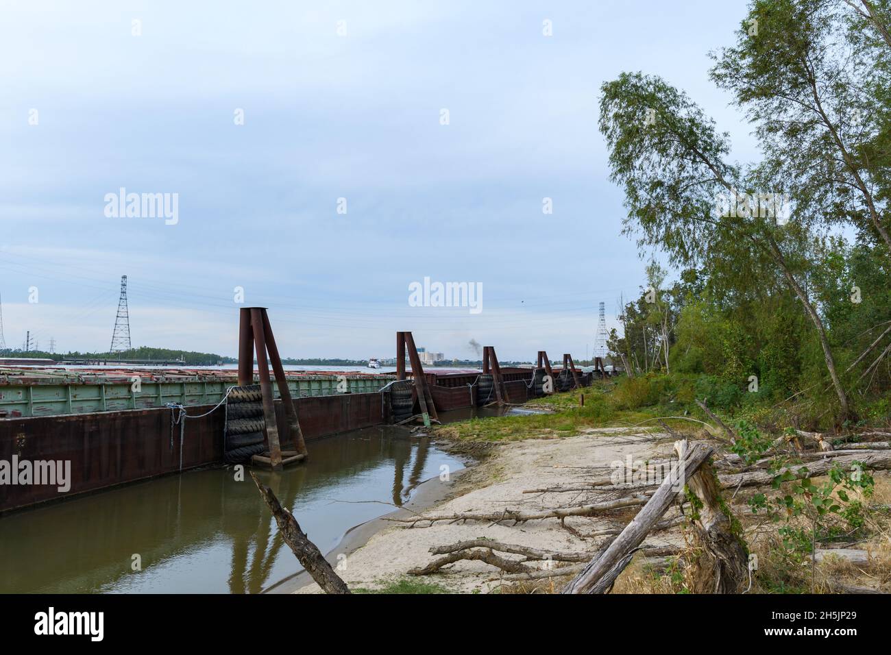 Barges docked along the Mississippi River in New Orleans, Louisiana