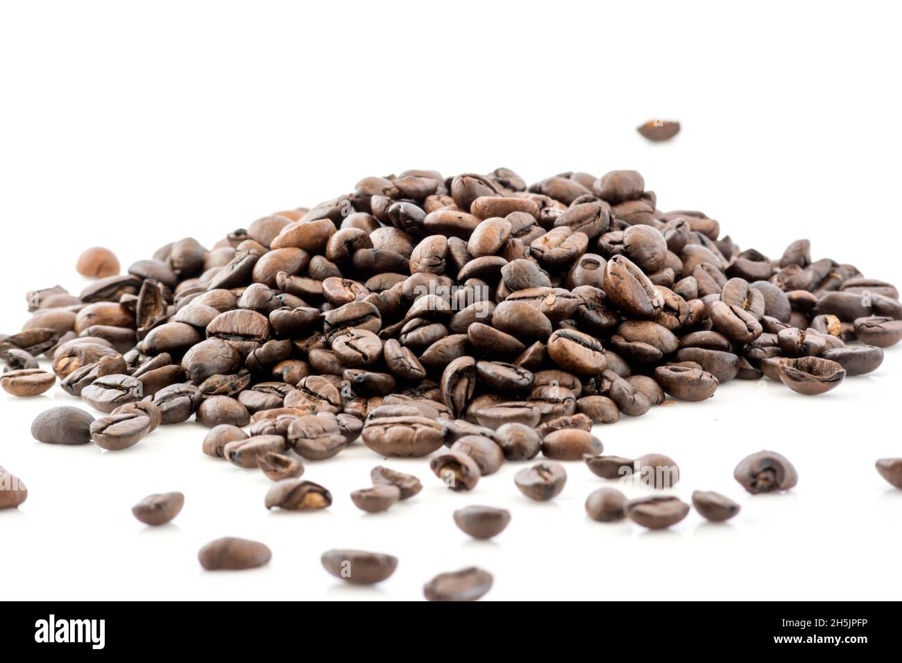 Coffee beans raw close up photo isolated on white background Stock Photo