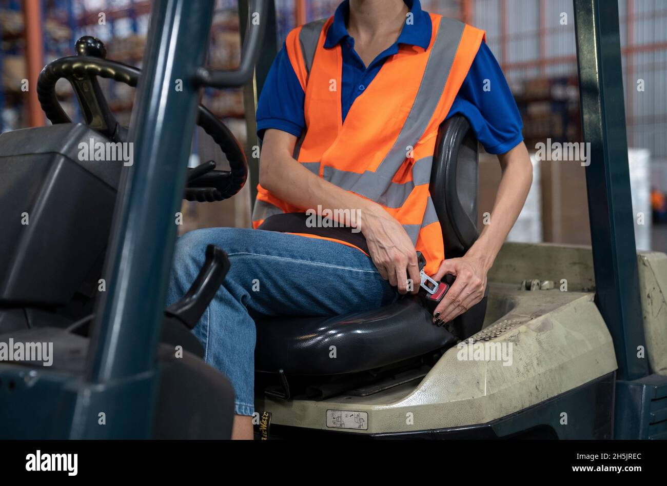 Safety first on forklifts in factory. Stock Photo