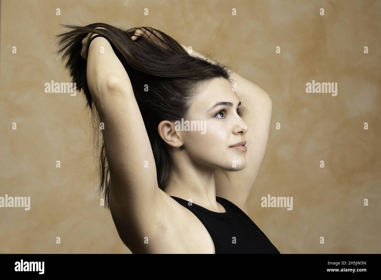 young Caucasian Girl Posing And showing Her Straight Hair Stock Photo ...