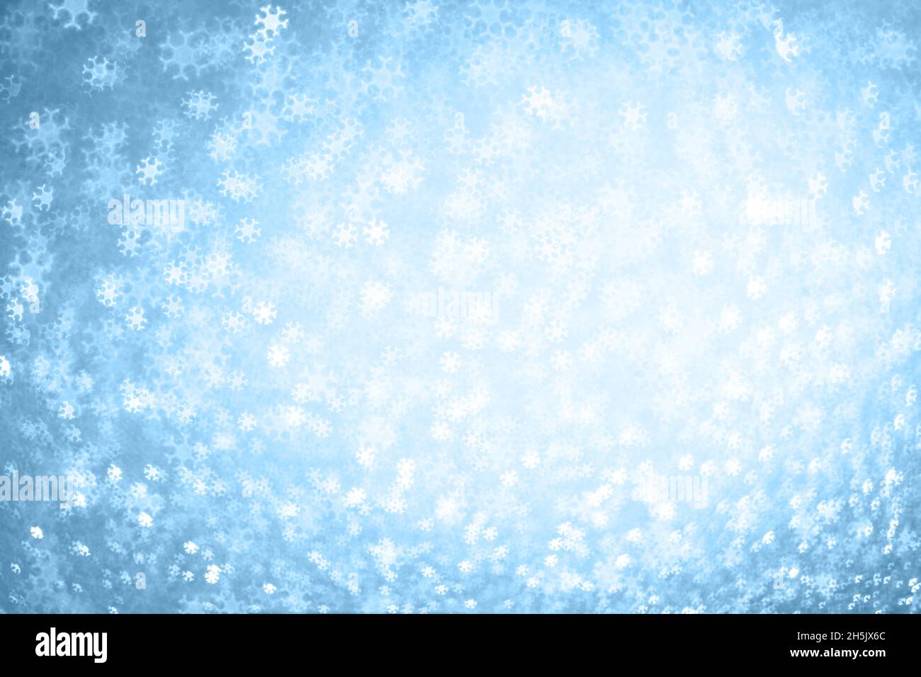 Blue blurred christmas background with snowflakes hi-res stock ...