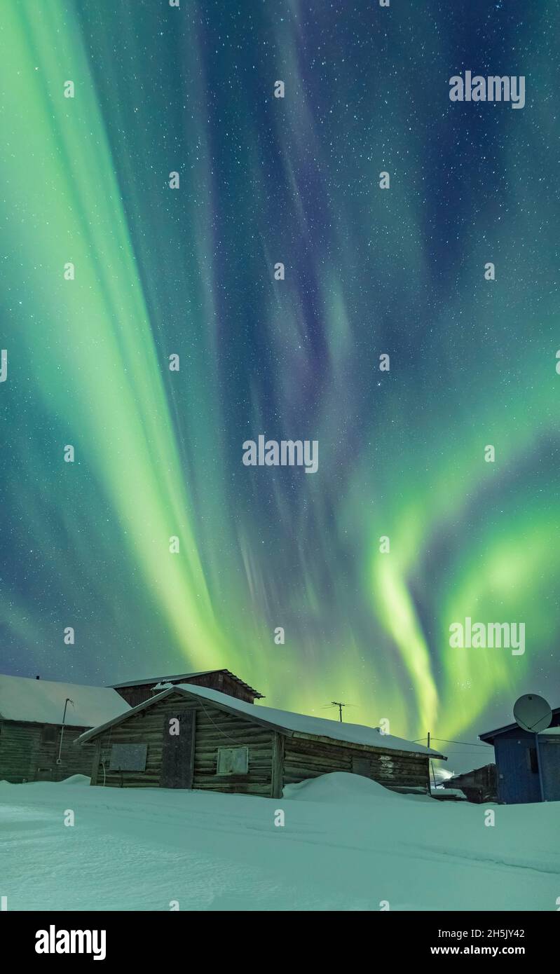 Northern Lights in the sky above the village of Nulato in winter