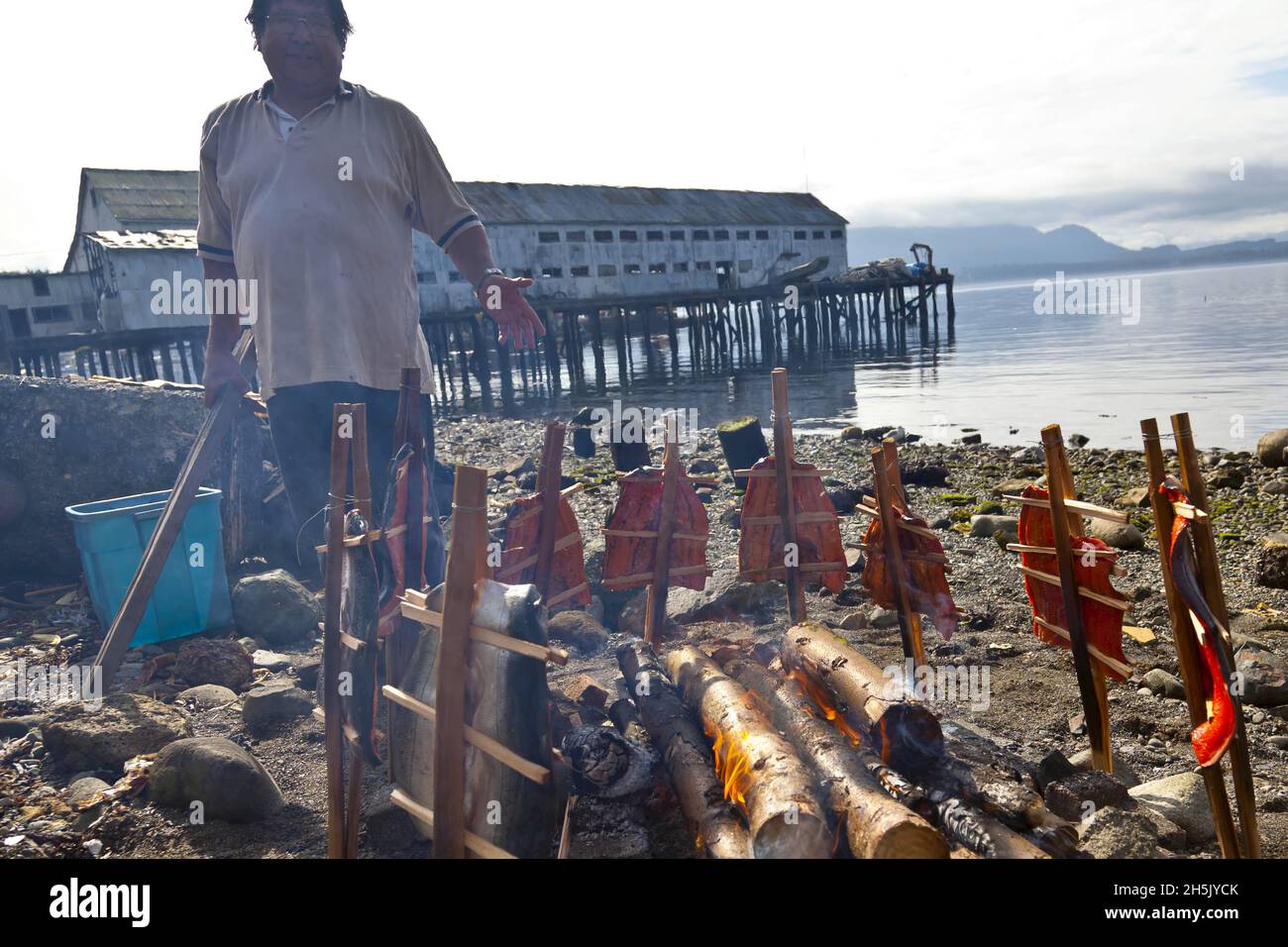 Native fisherman, smoking salmon, Alert Bay, First Nations community, Inside Passage, Great Bear Rainforest, British Columbia, Alaska Stock Photo