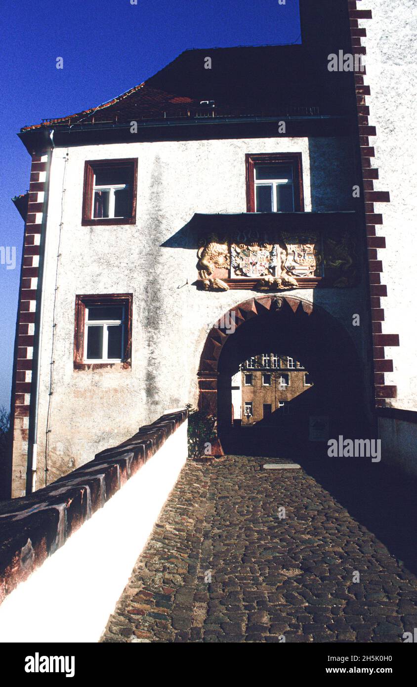 The gate to the inner courtyard of Colditz Castle. The castle in Saxony towering above the Mulde river, became famous during World War 2 as a POW camp for allied officers who undertook numerous spectacular escape attempts. Stock Photo