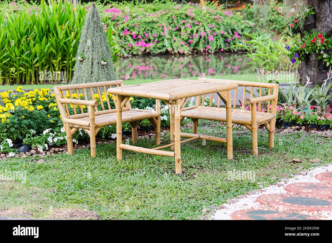 Bamboo chair in the garden Stock Photo Alamy