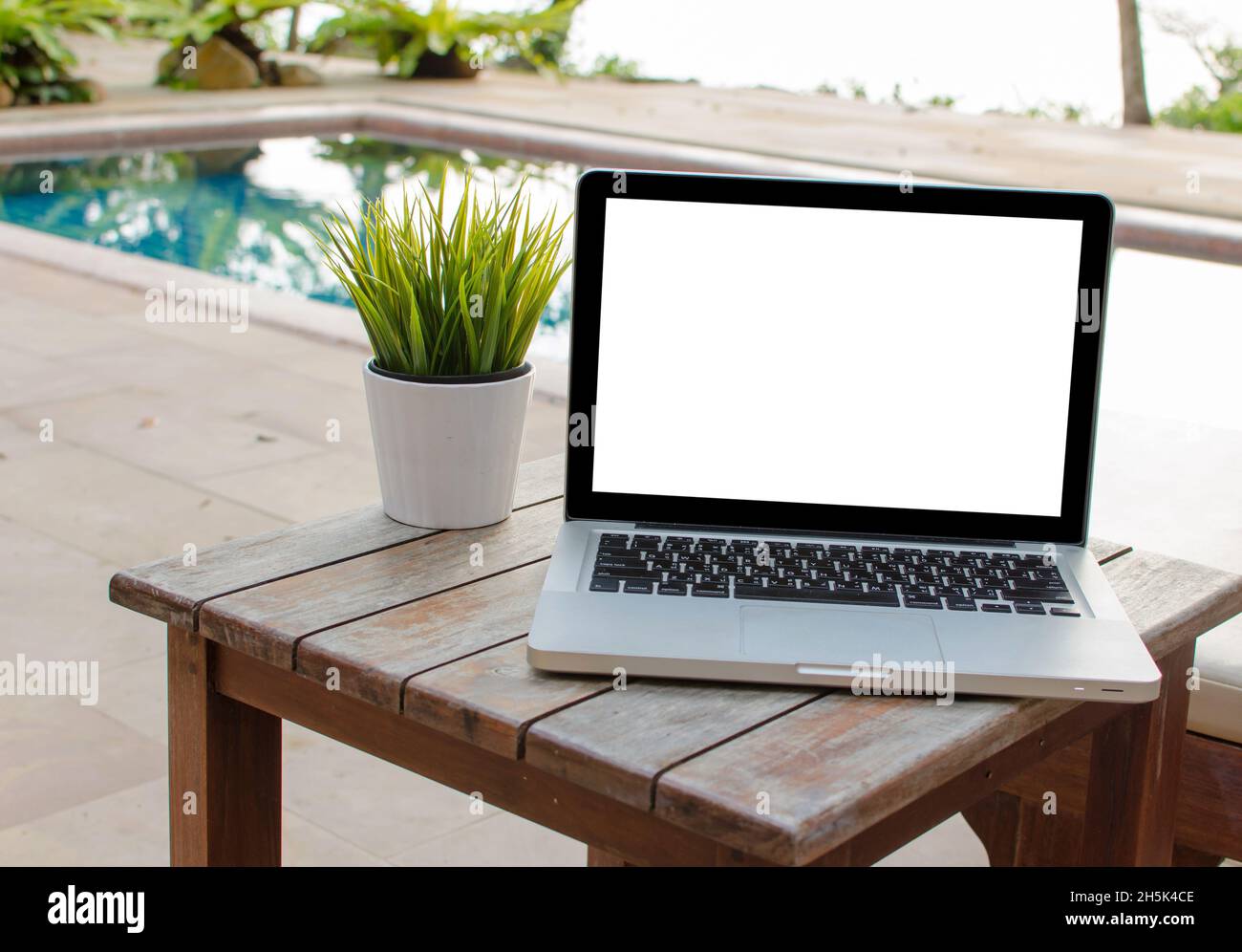 computer on table background as a pool Stock Photo - Alamy
