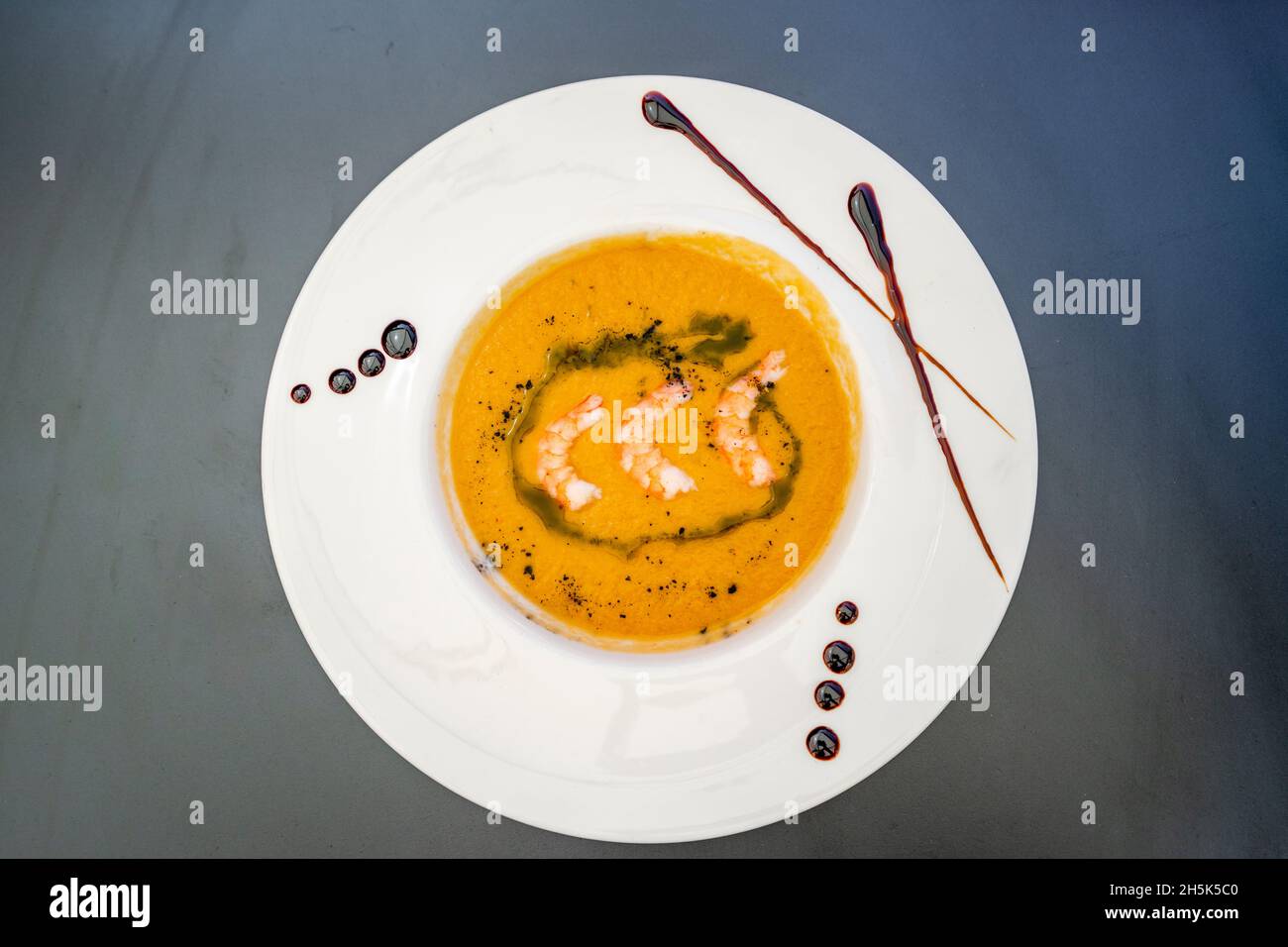 Salmorejo cold soup served with shrimps in Sierra Nevada, Spain Stock Photo
