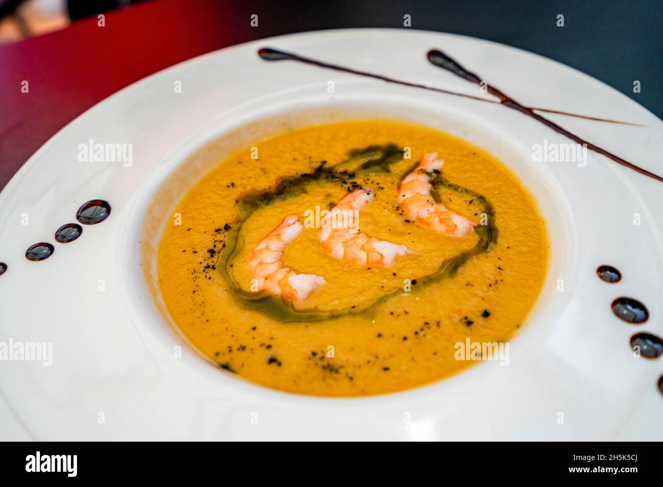 Salmorejo cold soup served with shrimps in Sierra Nevada, Spain Stock Photo