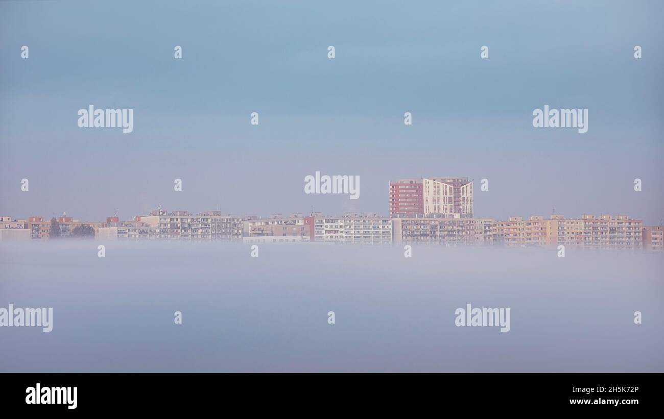 Housing estate in fog. Residential area during frosty autumn morning. Prague, Czech Republic Stock Photo