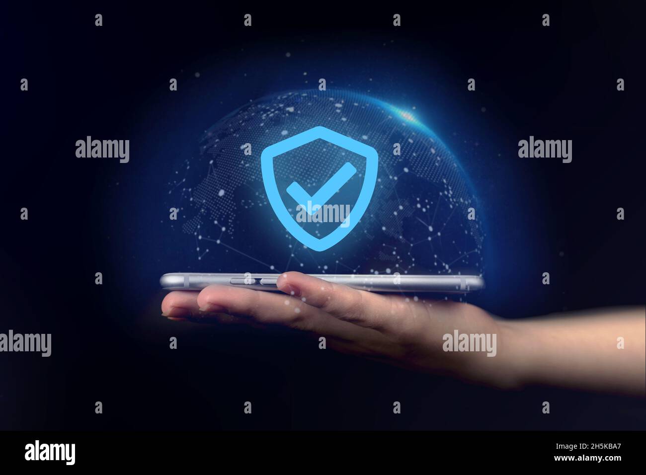 Data protection, privacy information. Hand holding mobile phone with shield. Cyber security network, internet technology concept Stock Photo