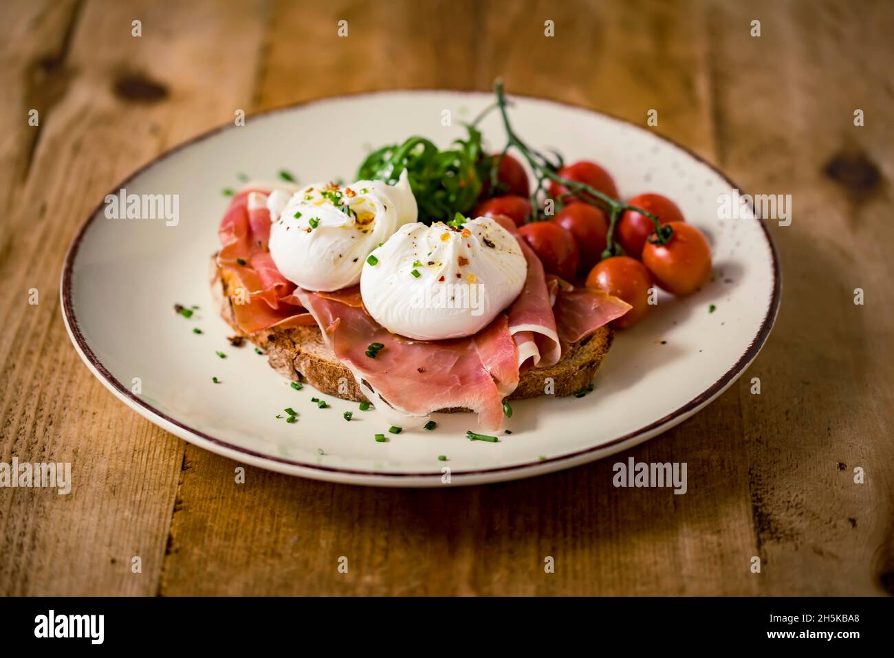 Prosciutto with mozzarella on toast; Studio Stock Photo Alamy